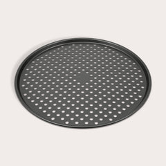 The Zyliss Non-Stick Pizza Tray is a round, black, carbon steel tray featuring numerous evenly spaced holes for crispy pizza bases. Shown on a white background.