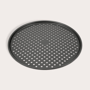 The Zyliss Non-Stick Pizza Tray is a round, black, carbon steel tray featuring numerous evenly spaced holes for crispy pizza bases. Shown on a white background.