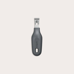 The Zyliss 2-In-1 Zester, made of stainless steel with a black ergonomic handle and a hole at the base, is an eco-friendly kitchen tool shown against a plain light background. 