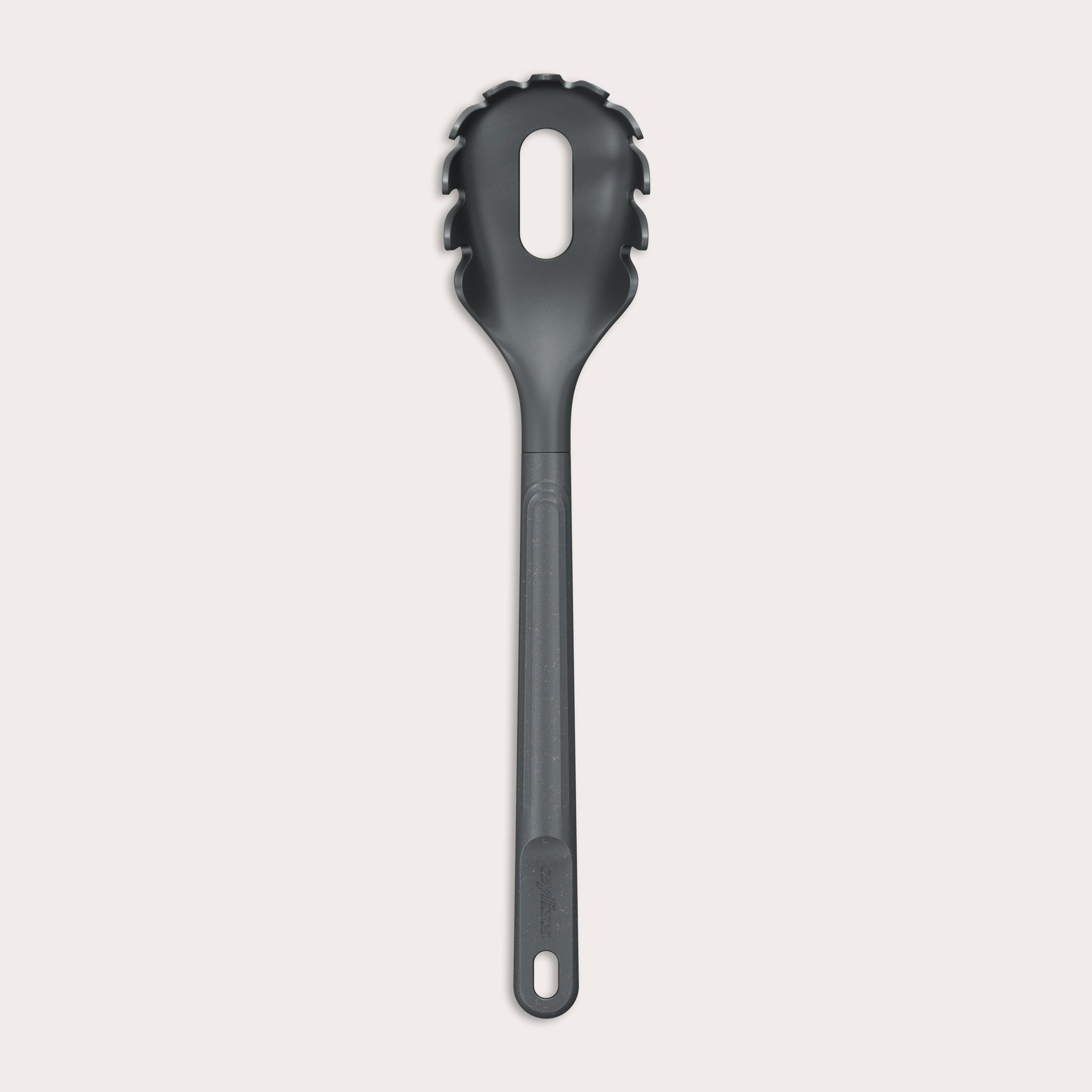 The Zyliss Spaghetti Server is a black, heat-resistant utensil with a long handle and slotted, rounded head featuring prongs for ideal portion control, shown isolated on a light background. 