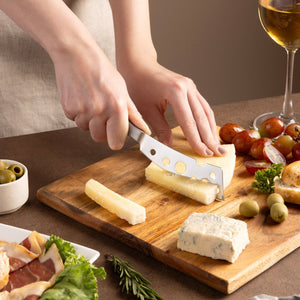 Zyliss Signature Semi-Soft Cheese Knife 116mm/4.6in — in use