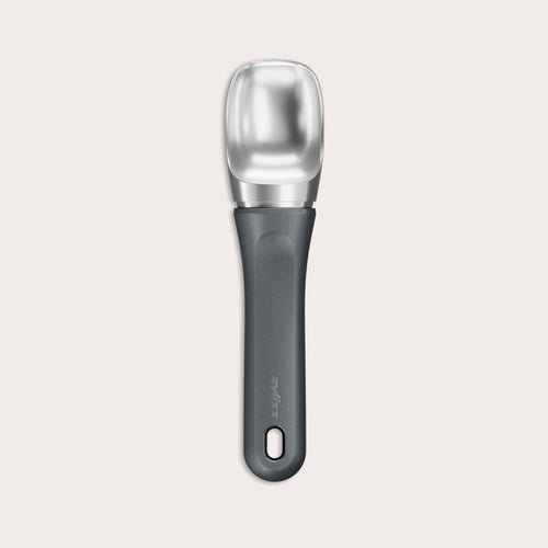 #belugagrey The Zyliss Ice Cream Scoop, featuring a wide deep bowl and eco-friendly handle, is displayed against a plain light background. 