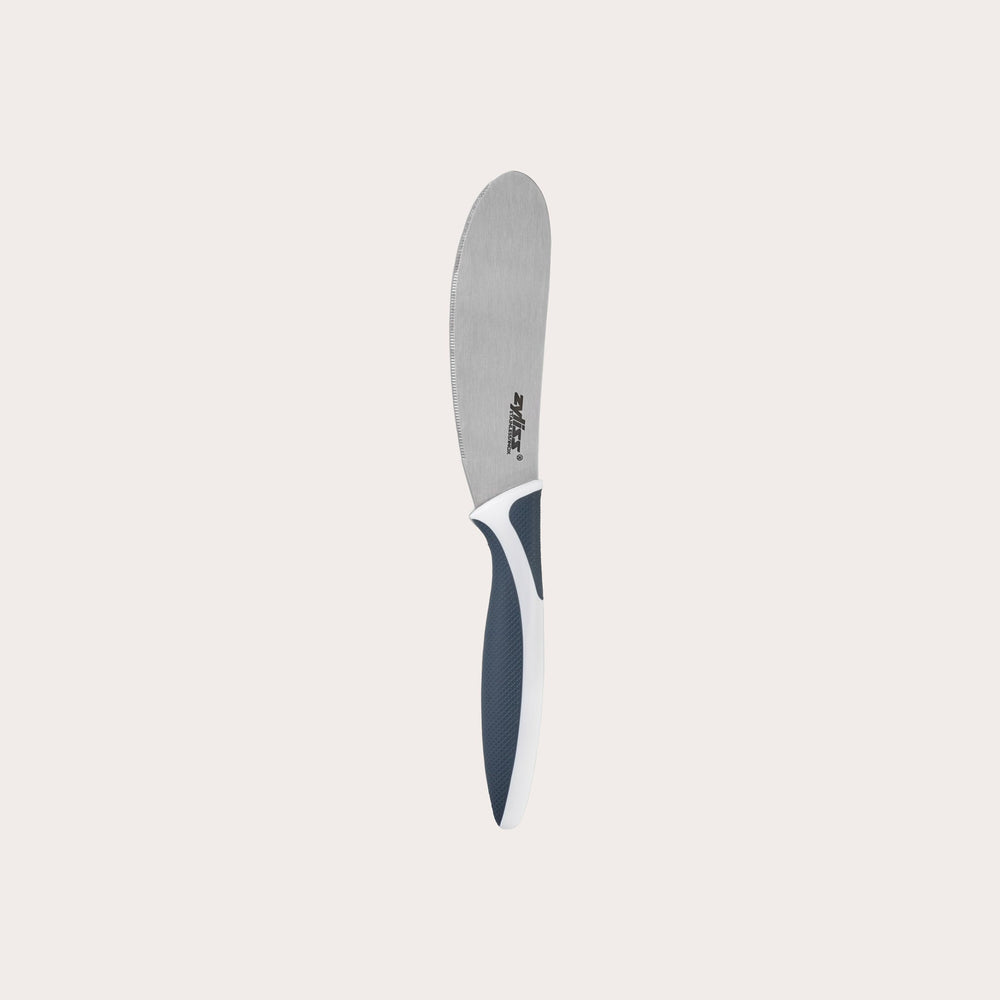 The Zyliss Comfort Spreading Knife 10.5cm / 4¼ features a stainless steel rounded blade and an ergonomic white and dark gray handle, shown on a plain light background. 